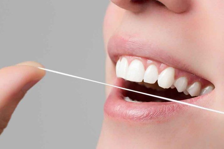 importancia de usar hilo dental