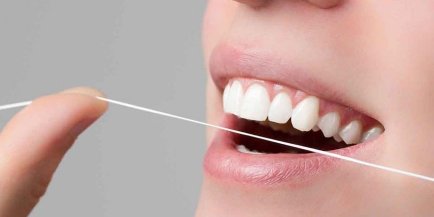 importancia de usar hilo dental